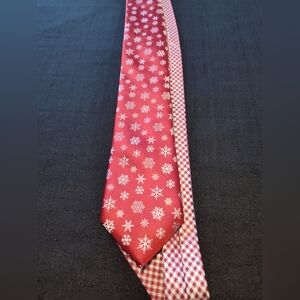 Men's holiday tie color red  snowflakes used great condition.brand Tie Tales